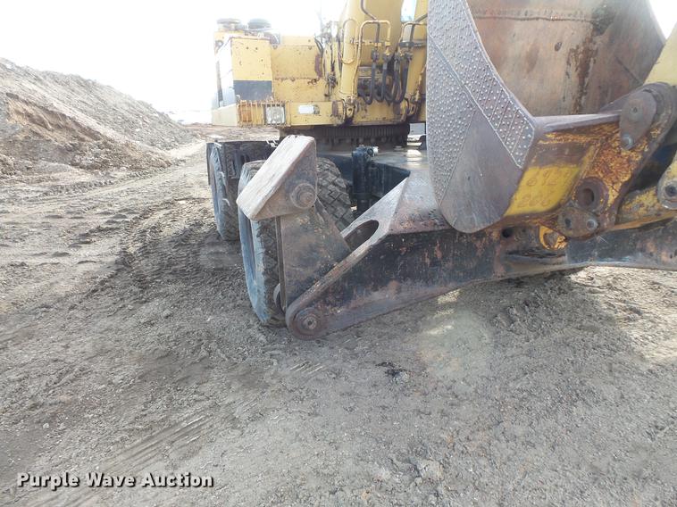 image for item DV9673 1985 Caterpillar 206 rubber tire excavator