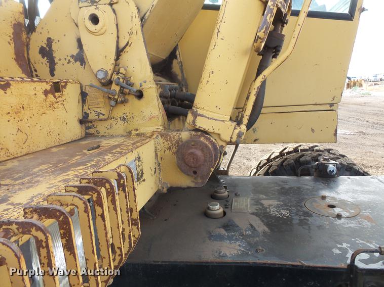 image for item DV9673 1985 Caterpillar 206 rubber tire excavator
