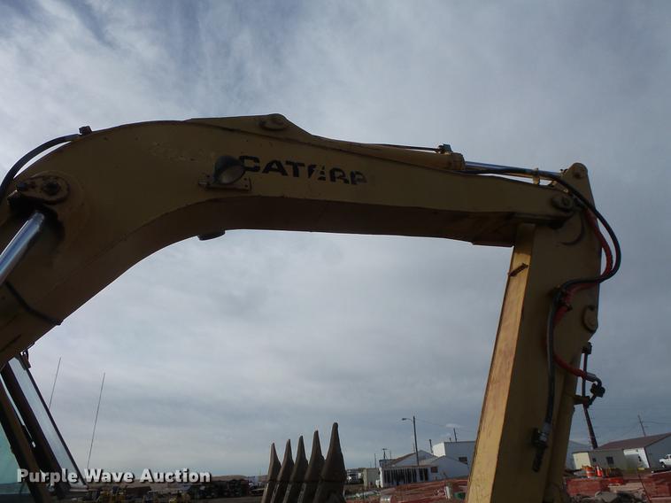 image for item DV9673 1985 Caterpillar 206 rubber tire excavator