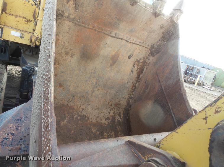 image for item DV9673 1985 Caterpillar 206 rubber tire excavator