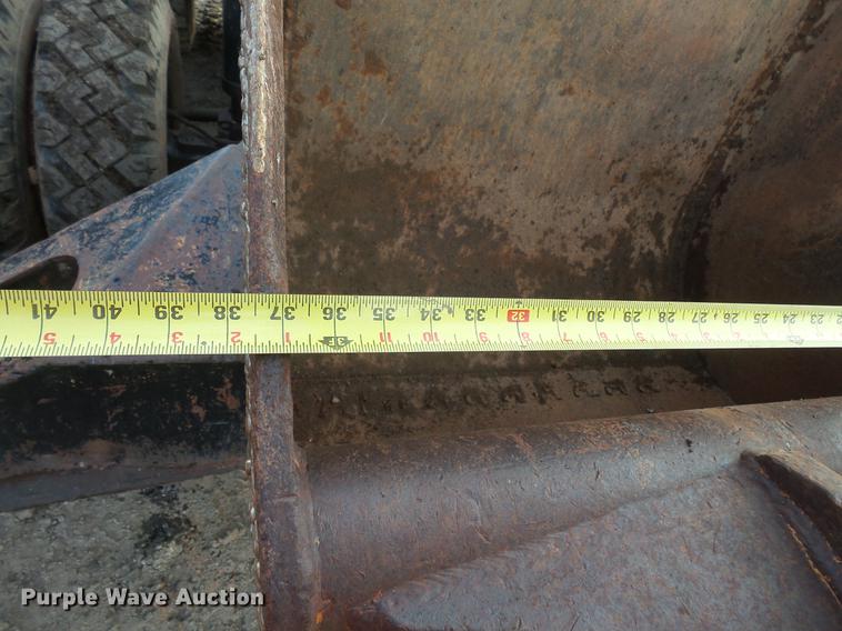 image for item DV9673 1985 Caterpillar 206 rubber tire excavator