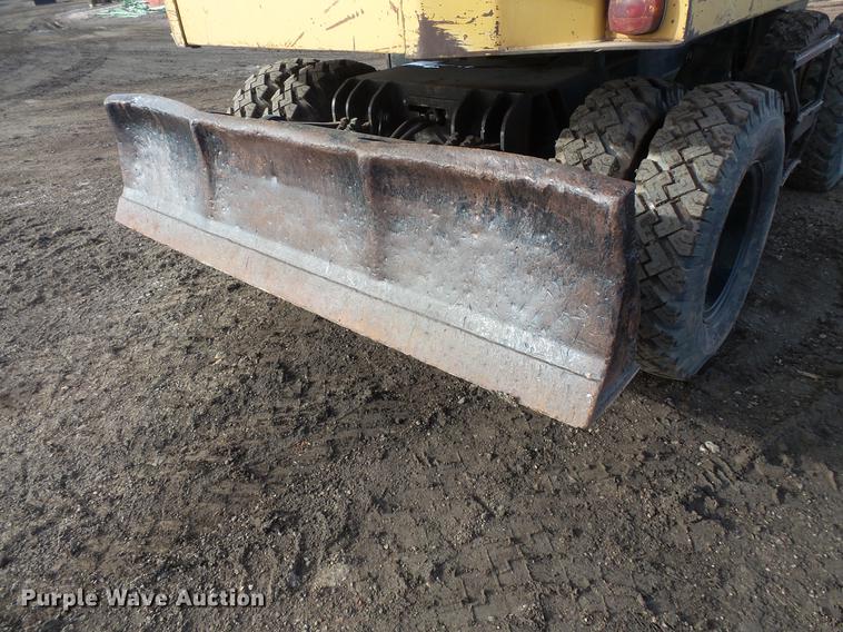 image for item DV9673 1985 Caterpillar 206 rubber tire excavator