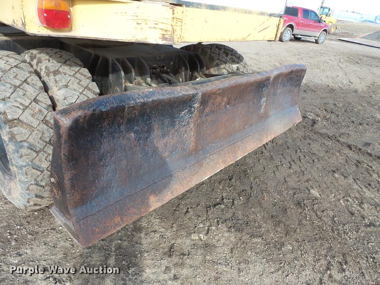 image for item DV9673 1985 Caterpillar 206 rubber tire excavator