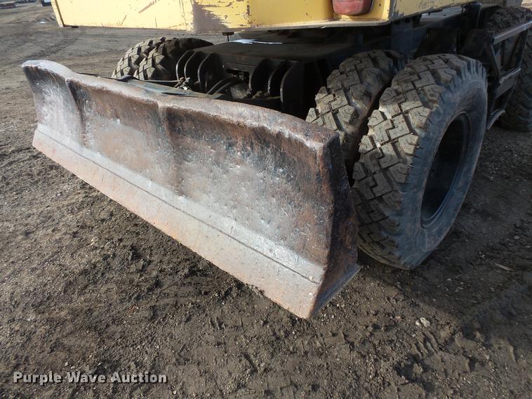 image for item DV9673 1985 Caterpillar 206 rubber tire excavator