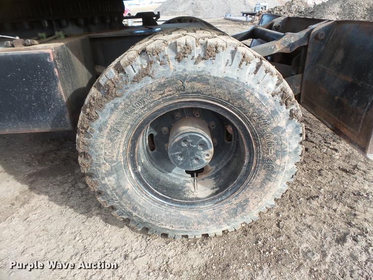 image for item DV9673 1985 Caterpillar 206 rubber tire excavator