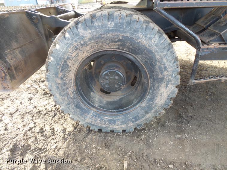 image for item DV9673 1985 Caterpillar 206 rubber tire excavator