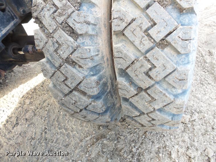 image for item DV9673 1985 Caterpillar 206 rubber tire excavator