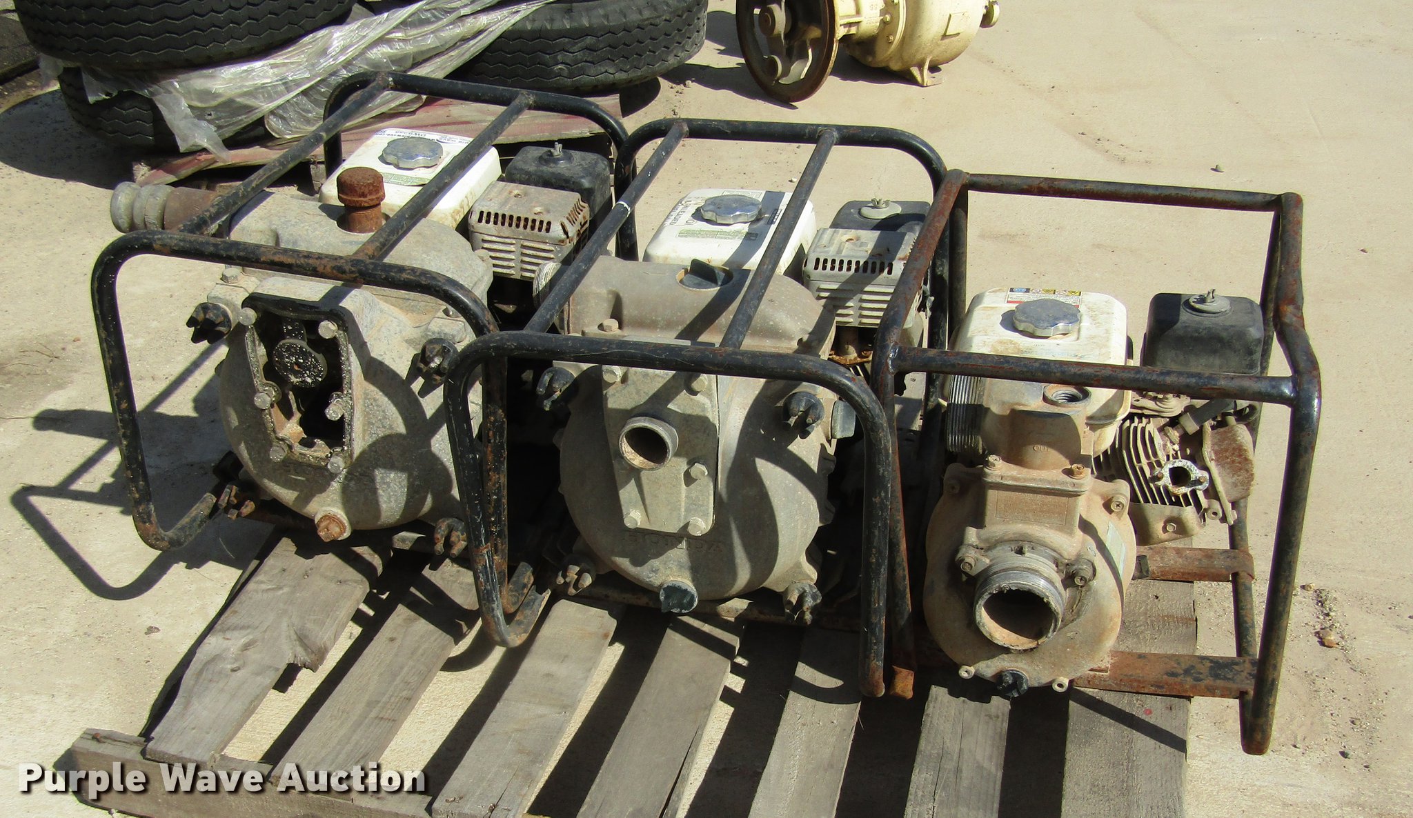 (3) trash pumps in Dayton, TX Item DW9255 sold Purple Wave