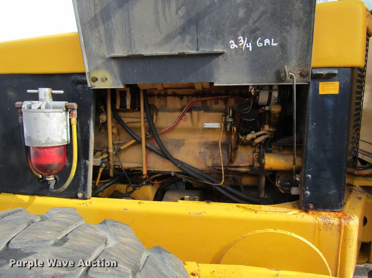 image for item DW9532 1975 John Deere 570A motor grader