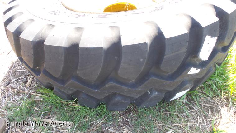 image for item EX9047 Goodyear 17.5R25 tire and wheel