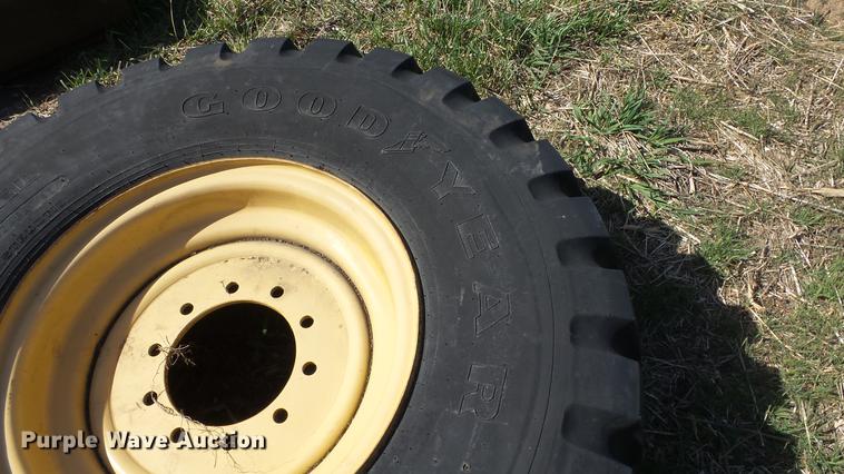 image for item EX9047 Goodyear 17.5R25 tire and wheel