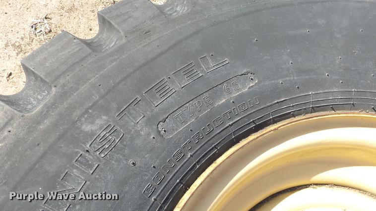 image for item EX9047 Goodyear 17.5R25 tire and wheel