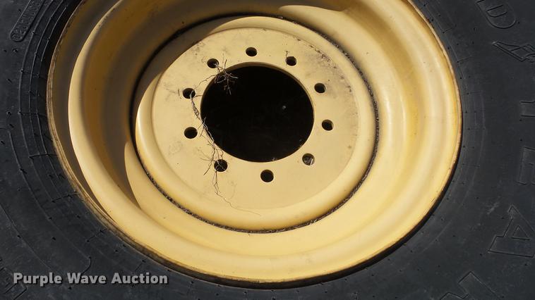 image for item EX9047 Goodyear 17.5R25 tire and wheel