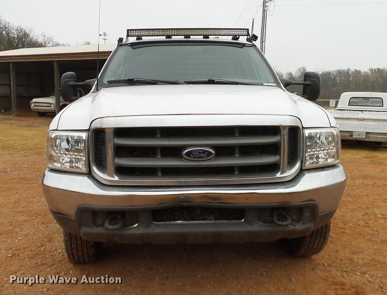 image for item AO9372 2000 Ford F350 Super Duty flatbed pickup truck