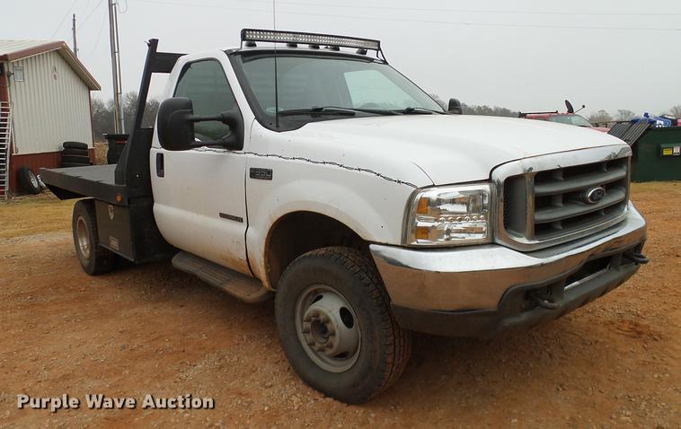 image for item AO9372 2000 Ford F350 Super Duty flatbed pickup truck