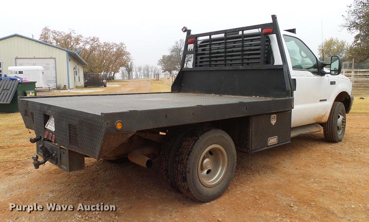 image for item AO9372 2000 Ford F350 Super Duty flatbed pickup truck