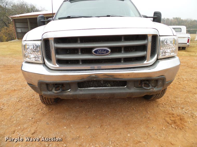 image for item AO9372 2000 Ford F350 Super Duty flatbed pickup truck