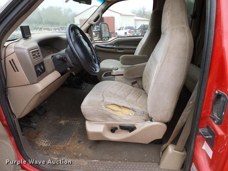 image for item AO9378 1999 Ford F350 Super Duty SuperCab flatbed pickup truck