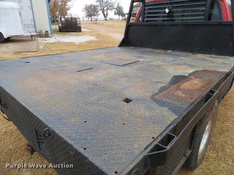 image for item AO9378 1999 Ford F350 Super Duty SuperCab flatbed pickup truck