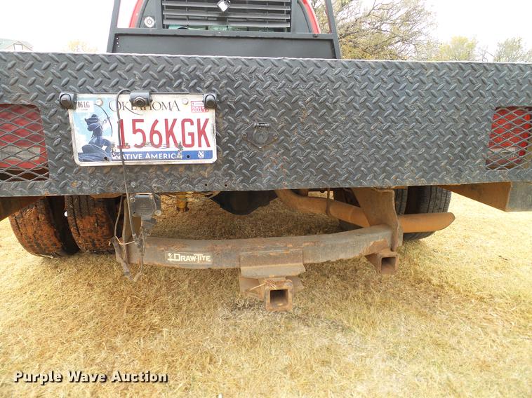 image for item AO9378 1999 Ford F350 Super Duty SuperCab flatbed pickup truck