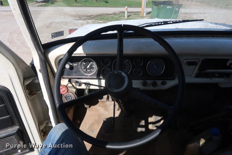 image for item DA0769 1979 Ford F800 flatbed truck with crane