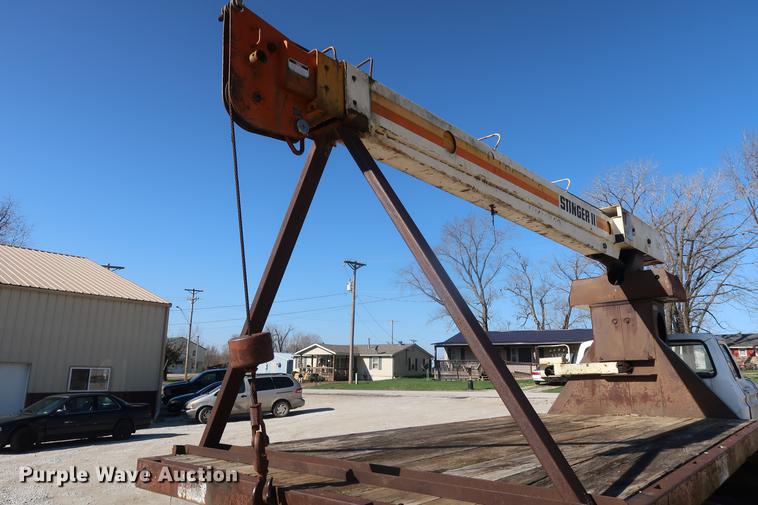 image for item DA0769 1979 Ford F800 flatbed truck with crane