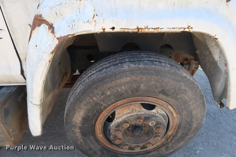 image for item DA0769 1979 Ford F800 flatbed truck with crane