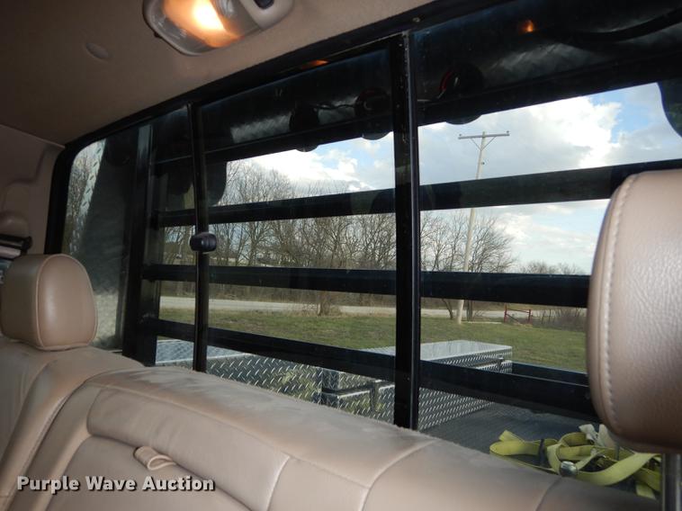 image for item DC0424 2004 Ford F350 Super Duy Lariat Crew Cab flatbed pickup truck