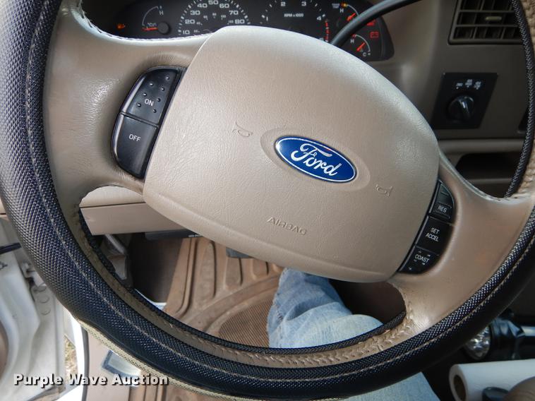 image for item DC0424 2004 Ford F350 Super Duy Lariat Crew Cab flatbed pickup truck