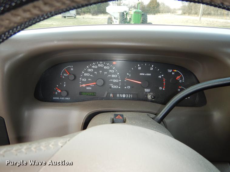 image for item DC0424 2004 Ford F350 Super Duy Lariat Crew Cab flatbed pickup truck