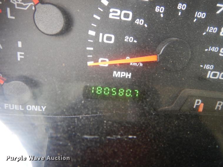 image for item DC0424 2004 Ford F350 Super Duy Lariat Crew Cab flatbed pickup truck