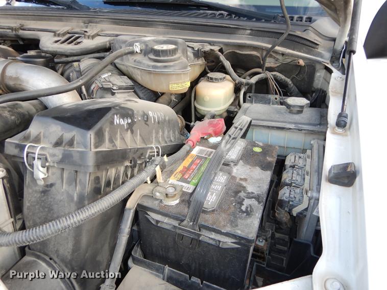 image for item DC0424 2004 Ford F350 Super Duy Lariat Crew Cab flatbed pickup truck