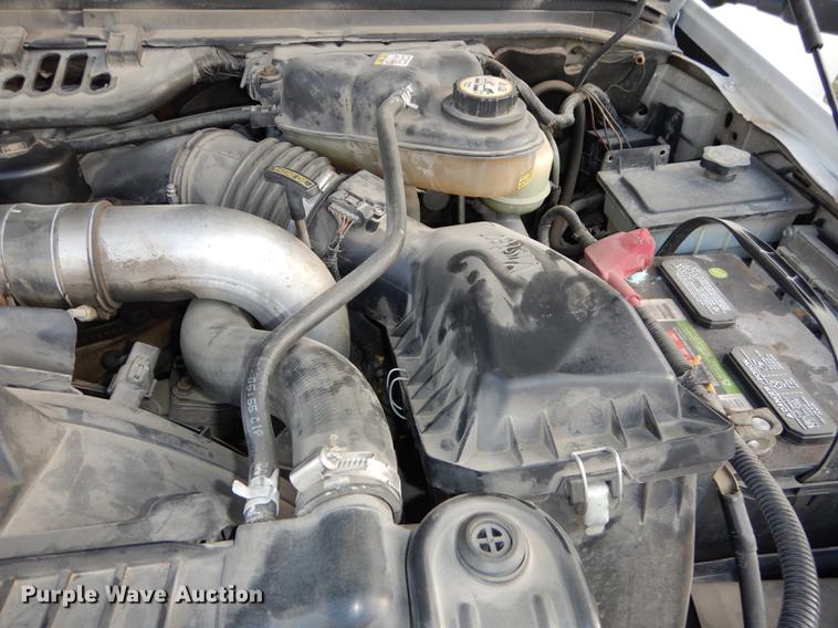 image for item DC0424 2004 Ford F350 Super Duy Lariat Crew Cab flatbed pickup truck