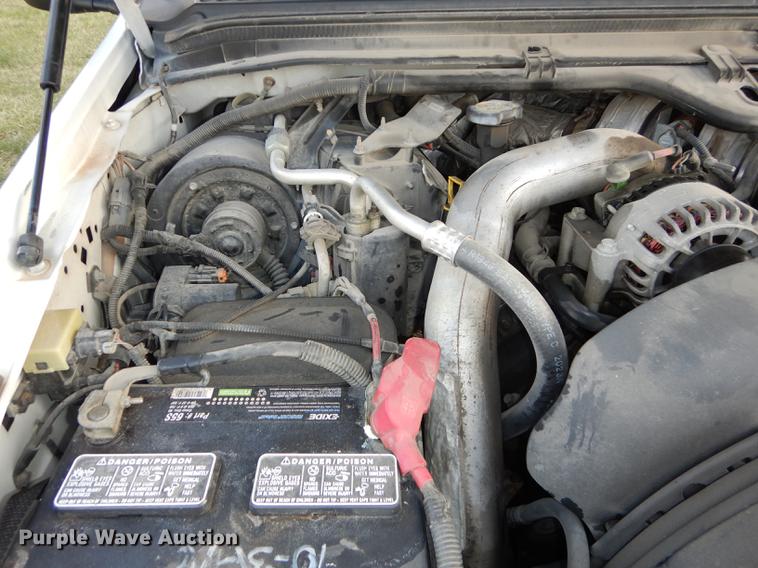 image for item DC0424 2004 Ford F350 Super Duy Lariat Crew Cab flatbed pickup truck