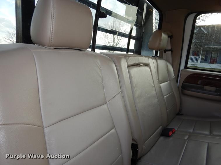 image for item DC0424 2004 Ford F350 Super Duy Lariat Crew Cab flatbed pickup truck