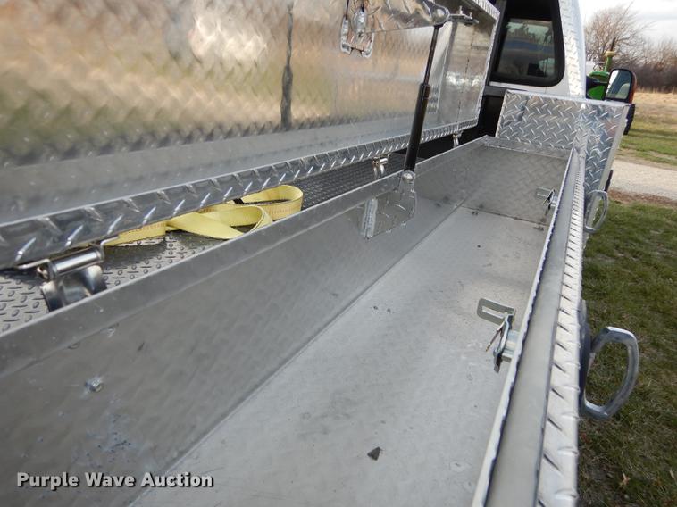 image for item DC0424 2004 Ford F350 Super Duy Lariat Crew Cab flatbed pickup truck