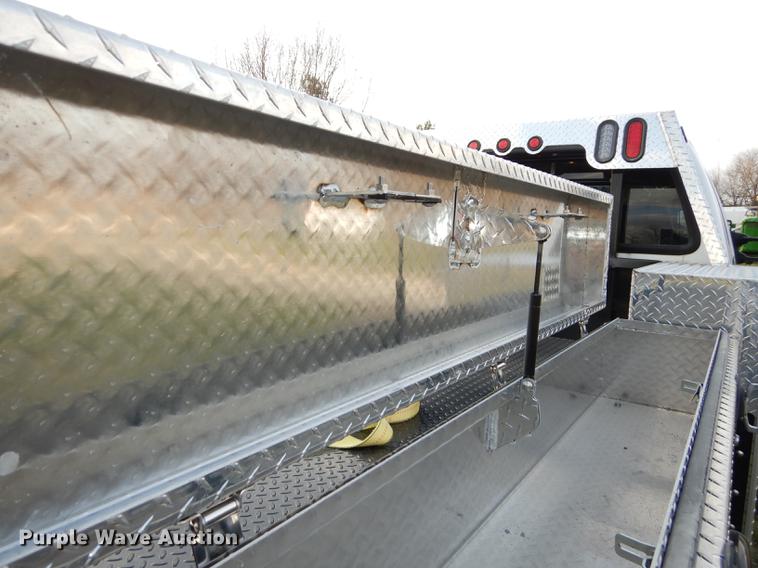 image for item DC0424 2004 Ford F350 Super Duy Lariat Crew Cab flatbed pickup truck