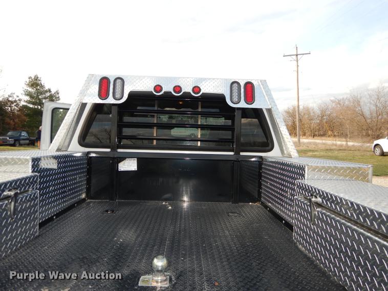 image for item DC0424 2004 Ford F350 Super Duy Lariat Crew Cab flatbed pickup truck