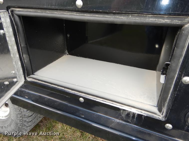 image for item DC0424 2004 Ford F350 Super Duy Lariat Crew Cab flatbed pickup truck