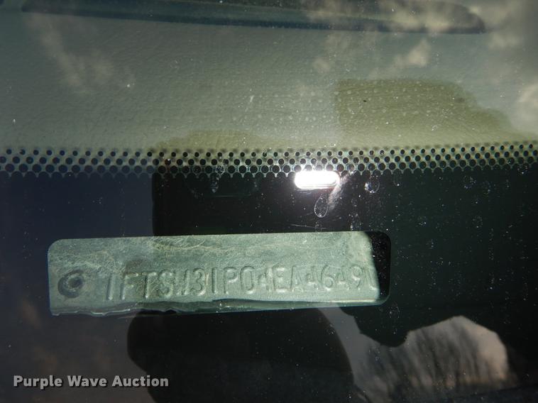 image for item DC0424 2004 Ford F350 Super Duy Lariat Crew Cab flatbed pickup truck