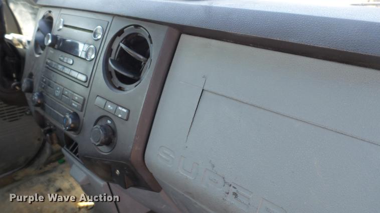 image for item DC5566 2012 Ford F250 Super Duty utility bed pickup truck