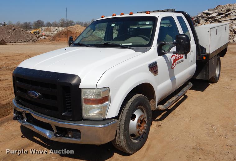 image for item EJ9903 2008 Ford F350 Super Duty SuperCab flatbed pickup truck