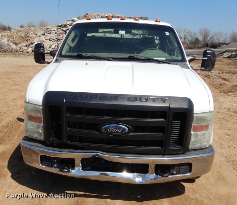 image for item EJ9903 2008 Ford F350 Super Duty SuperCab flatbed pickup truck