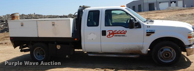 image for item EJ9903 2008 Ford F350 Super Duty SuperCab flatbed pickup truck