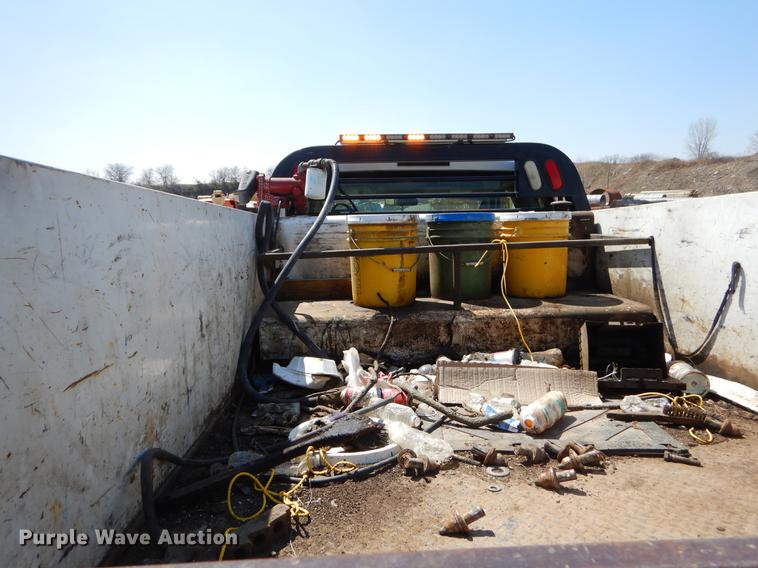 image for item EJ9903 2008 Ford F350 Super Duty SuperCab flatbed pickup truck