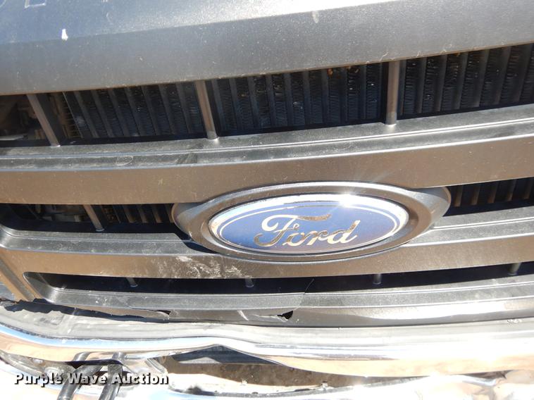 image for item EJ9903 2008 Ford F350 Super Duty SuperCab flatbed pickup truck