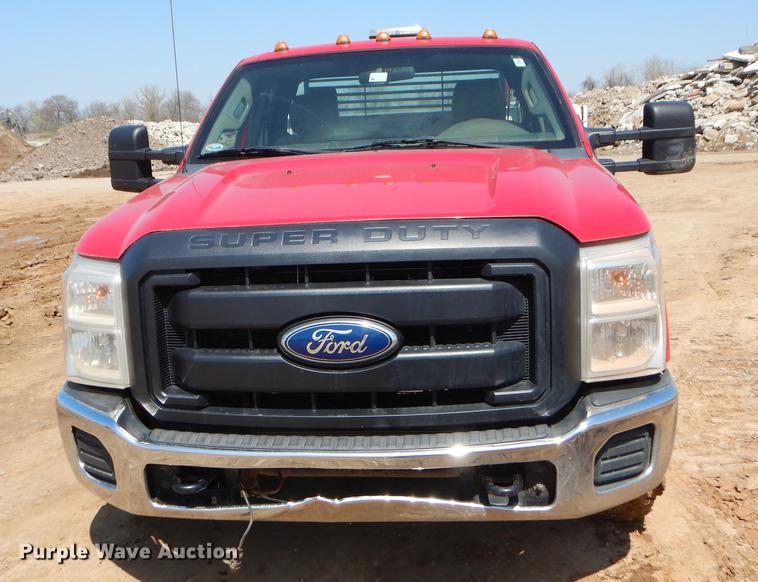 image for item EJ9905 2011 Ford F350 Super Duty SuperCab flatbed pickup truck