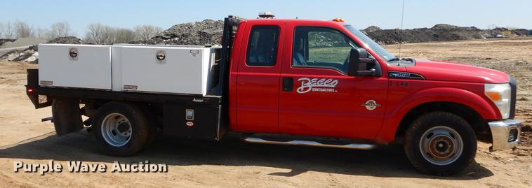 image for item EJ9905 2011 Ford F350 Super Duty SuperCab flatbed pickup truck