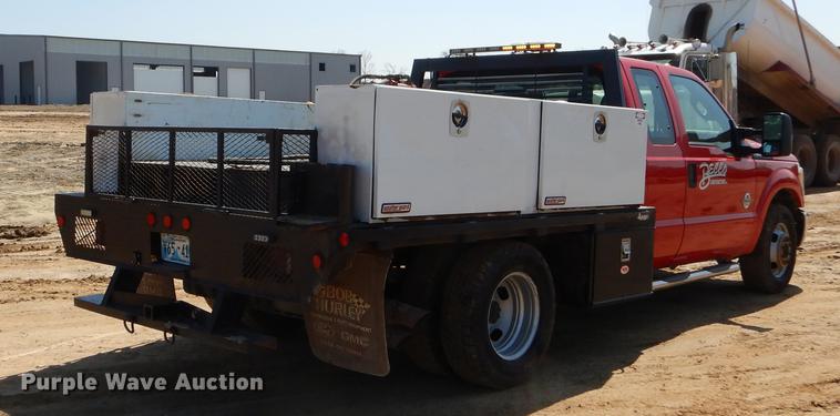 image for item EJ9905 2011 Ford F350 Super Duty SuperCab flatbed pickup truck