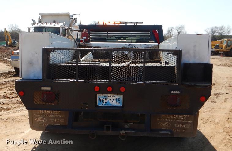 image for item EJ9905 2011 Ford F350 Super Duty SuperCab flatbed pickup truck